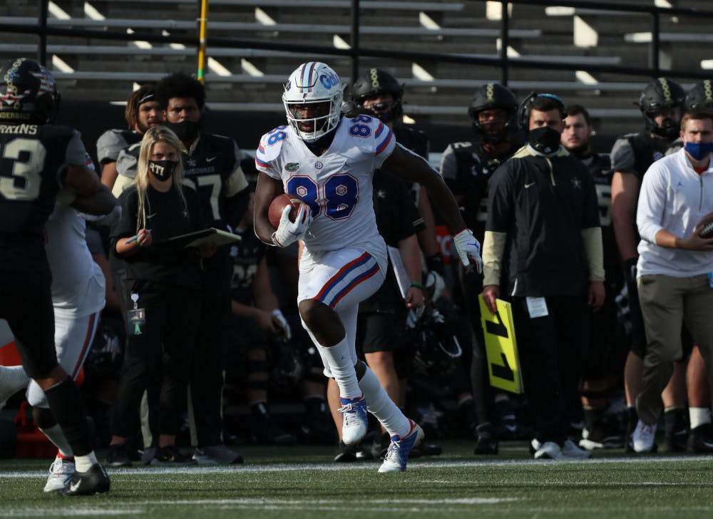 Tight end Kemore Gamble runs with the football in Florida's game against Vanderbilt on Nov. 21. Gamble contributed three receptions for 66 yards and one touchdown to the Gators' win over the Commodores.