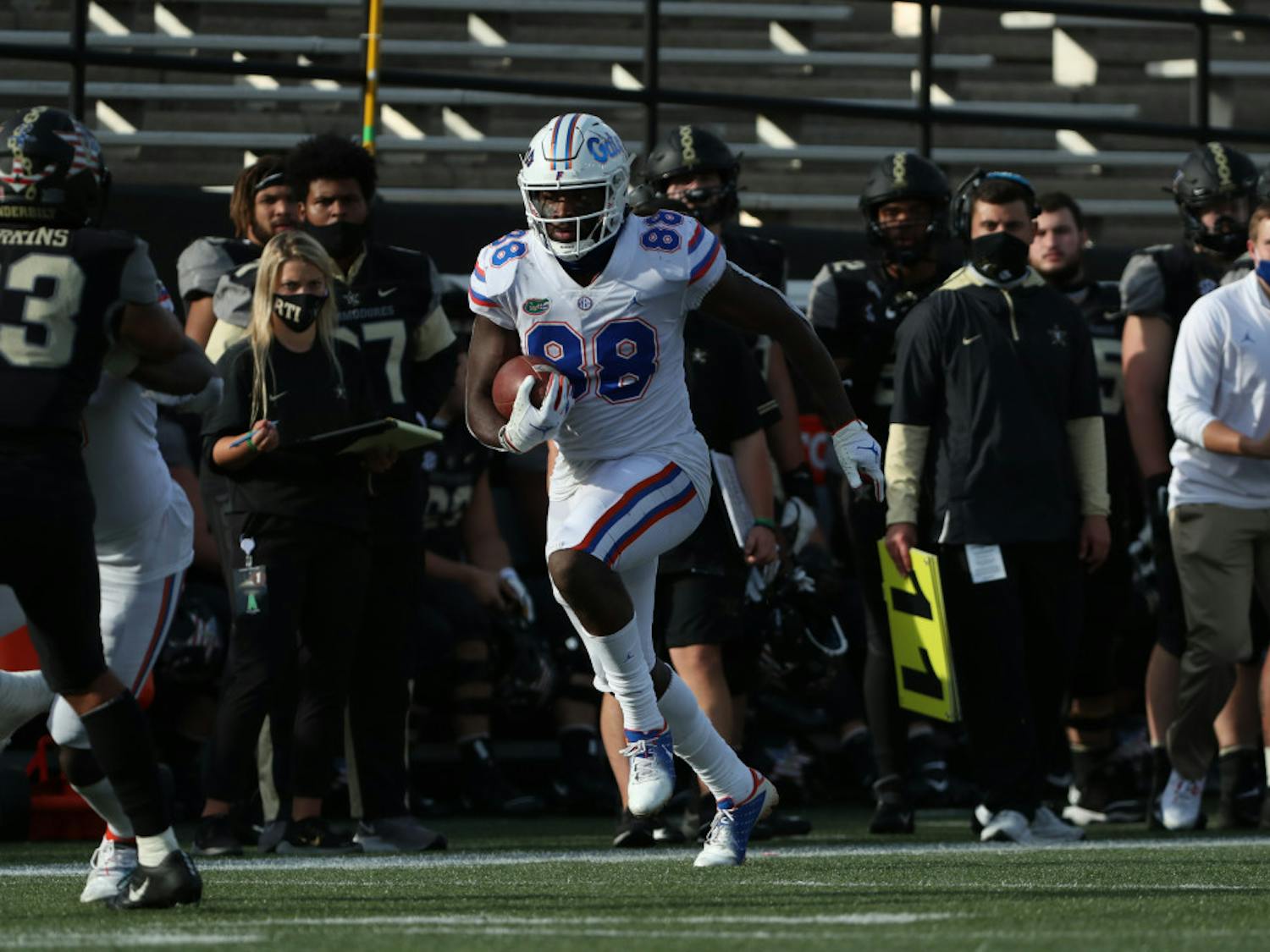 Tight end Kemore Gamble runs with the football in Florida's game against Vanderbilt on Nov. 21. Gamble contributed three receptions for 66 yards and one touchdown to the Gators' win over the Commodores.