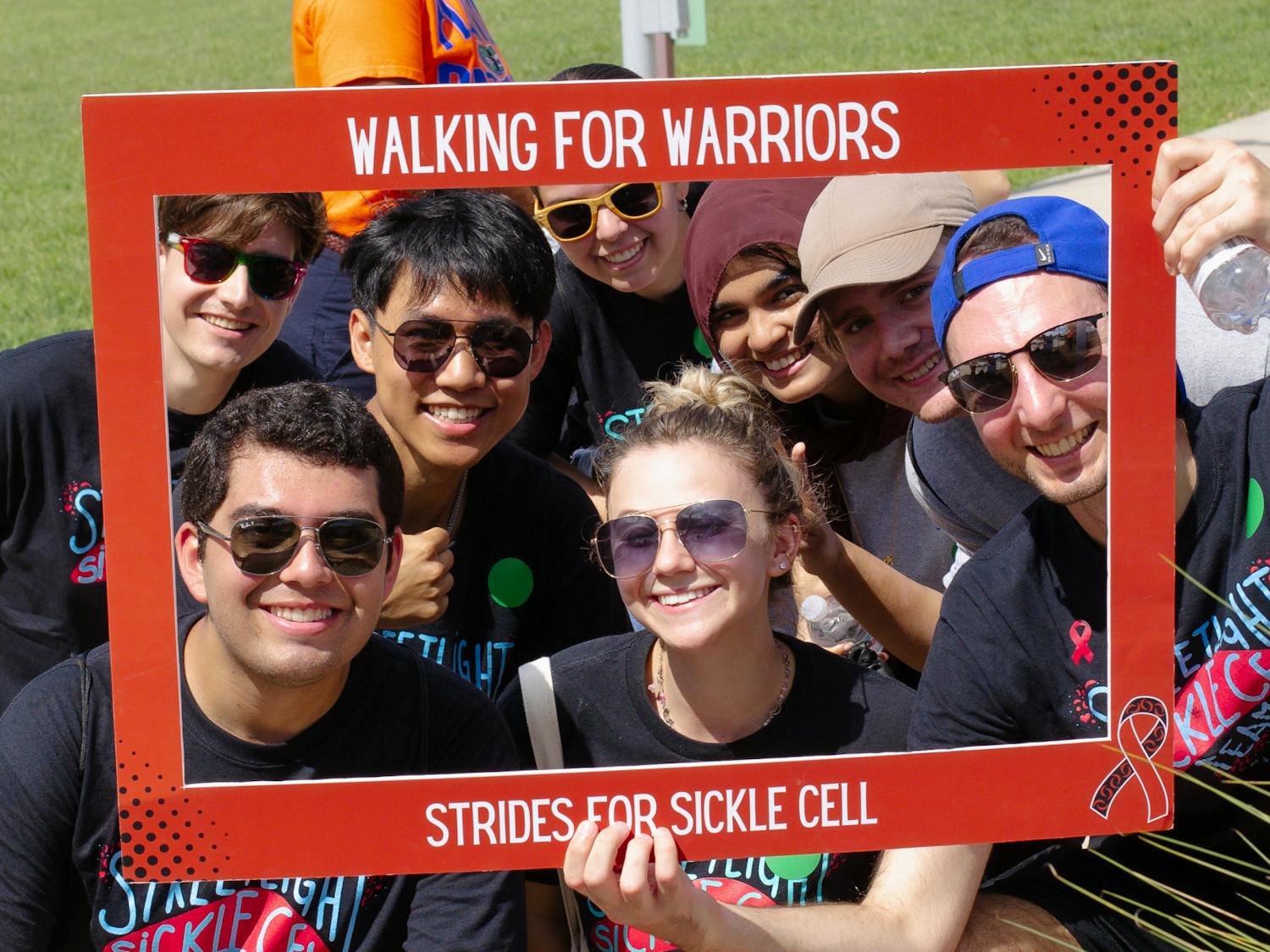 Participants at the Walk for Sickle Cell event pose for a photo finish on Saturday, Sept. 21, 2024.