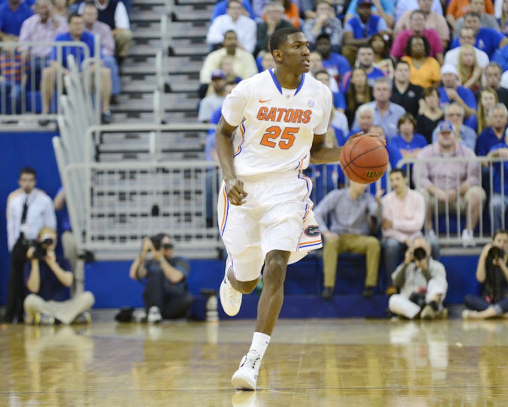 <p>DeVon Walker drives down the court during Florida’s 71-66 win against Auburn on Feb. 19 in the O’Connell Center. Walker has hit 8 of his last 14 three-point shots.</p>