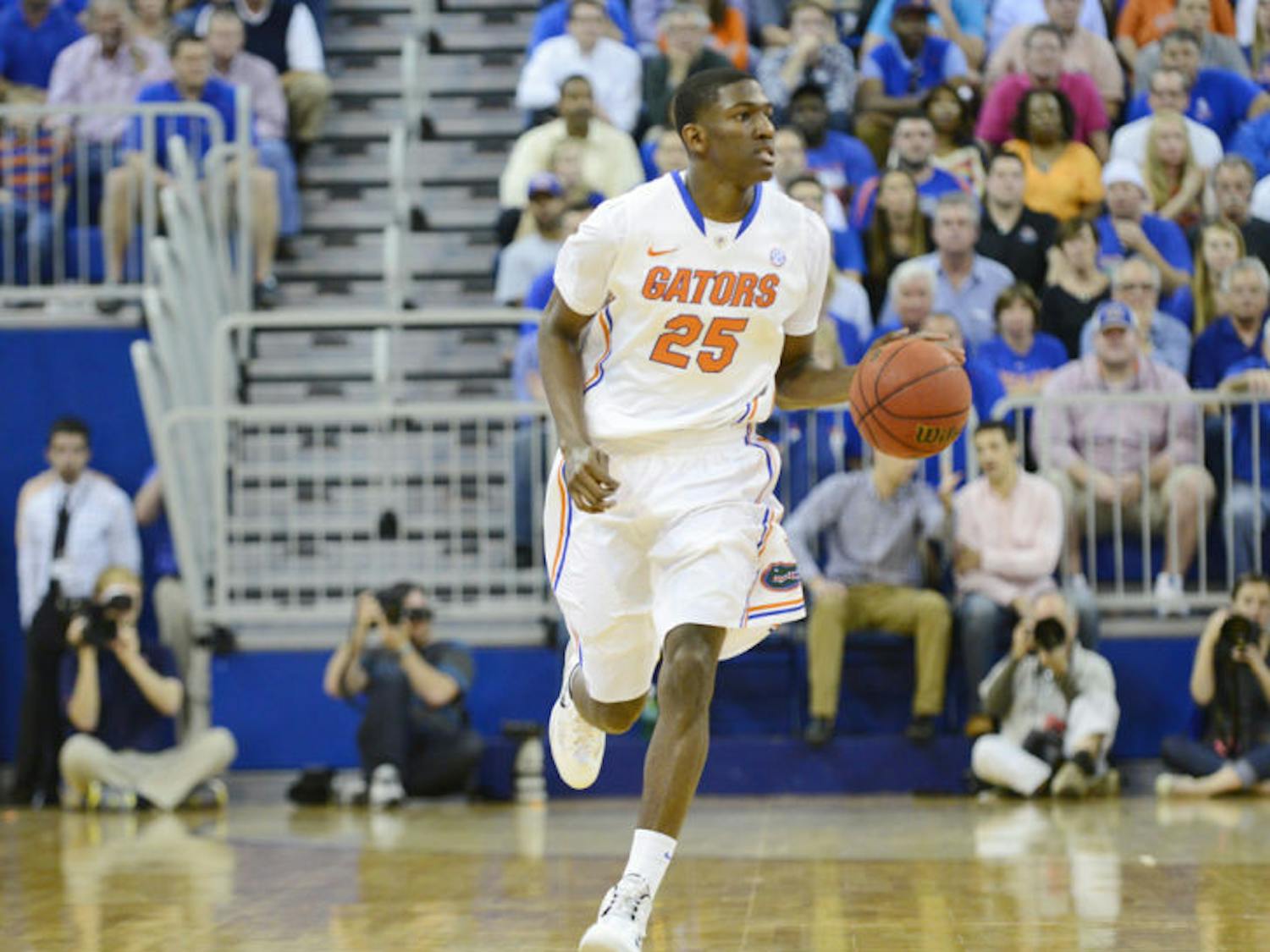 DeVon Walker drives down the court during Florida’s 71-66 win against Auburn on Feb. 19 in the O’Connell Center. Walker has hit 8 of his last 14 three-point shots.