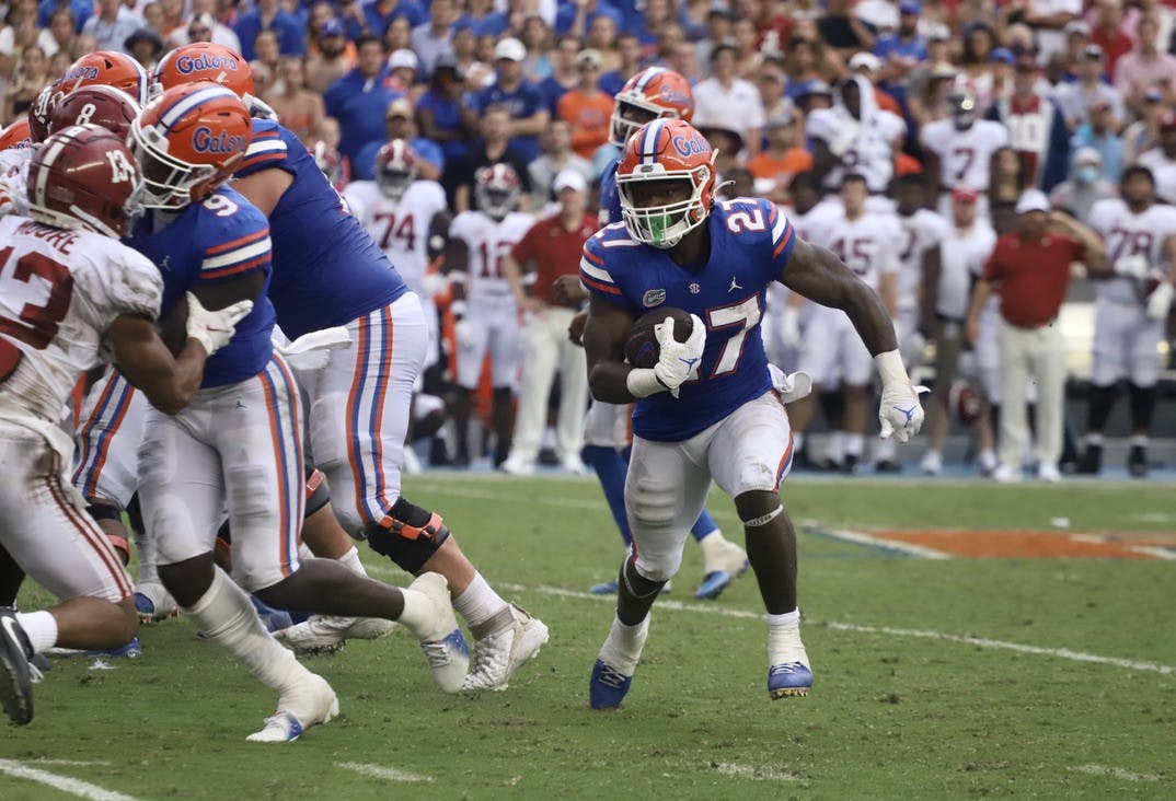Florida's Dameon Pierce rushes toward the edge of his offensive line against No. 1 Alabama on Sept. 18, 2021.