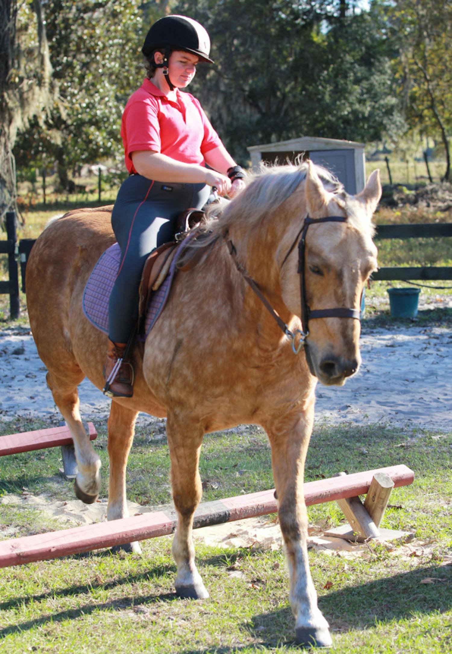 Kathy Gray, 35, of Citra, Fla., rides Barney at the High Times Ranch, a therapeutic horse ranch.