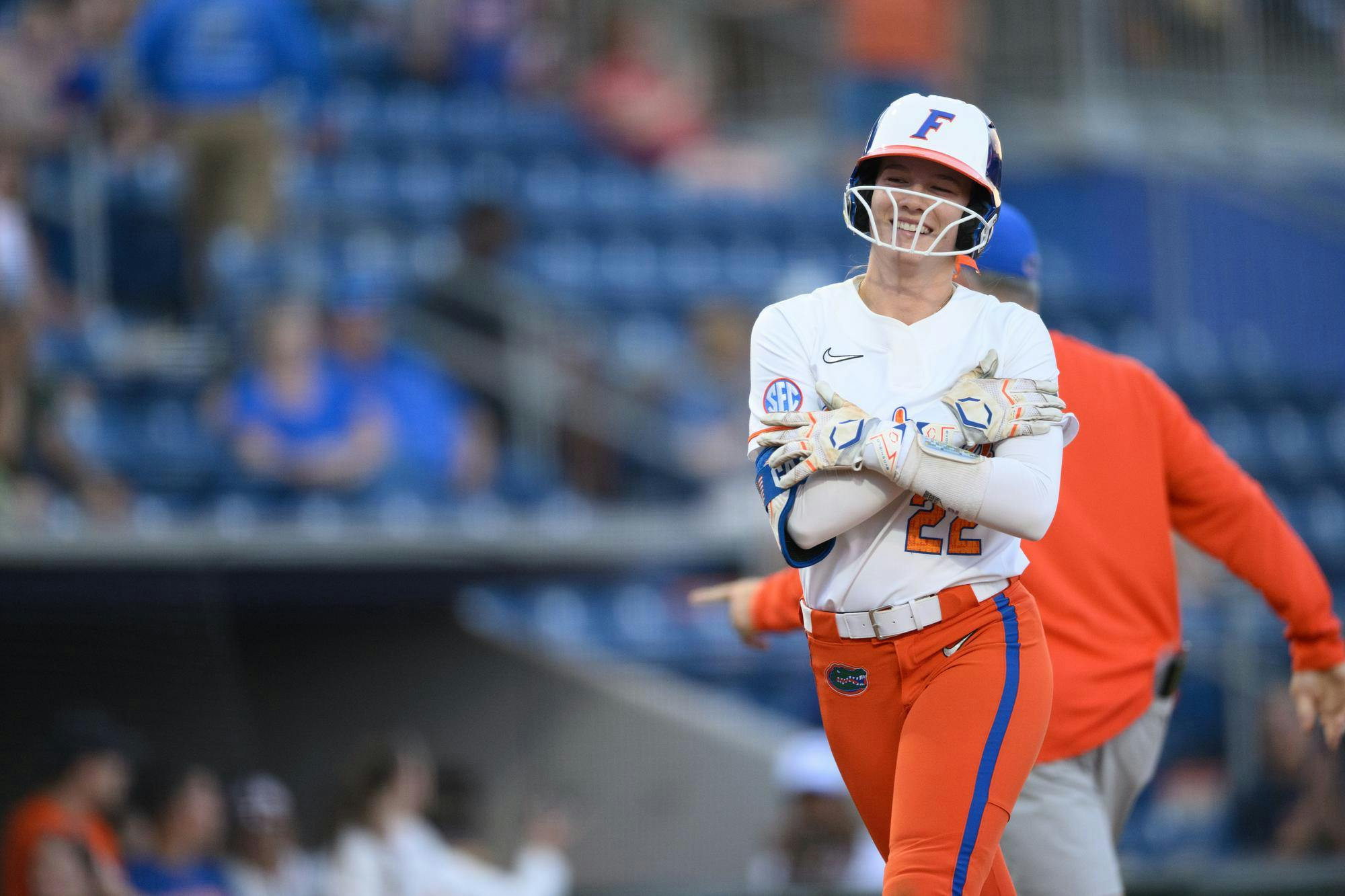 Florida outfielder Cassidy McLellan (22) wipes her sholders after hitting a home run during an NCAA softball game against FGCU, Wednesday, April 15, 2026, in Gainesville, Fla.