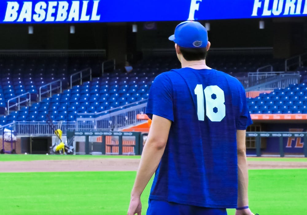 <p>Florida left-handed pitcher Pierce Coppola gazes across the field at Condron Ballpark during a practice session last Fall.</p>