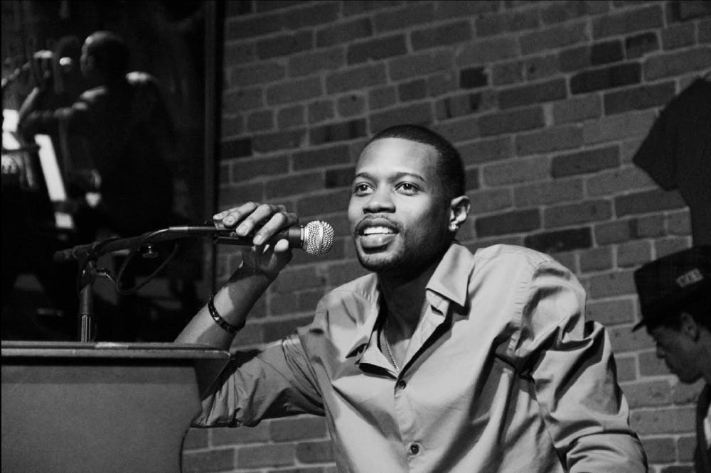 Jaime Hinckson speaks to the audience between songs at Rockeys Dueling Piano Bar on Sunday. He said he likes that people can enjoy his music and interpret it however they choose.