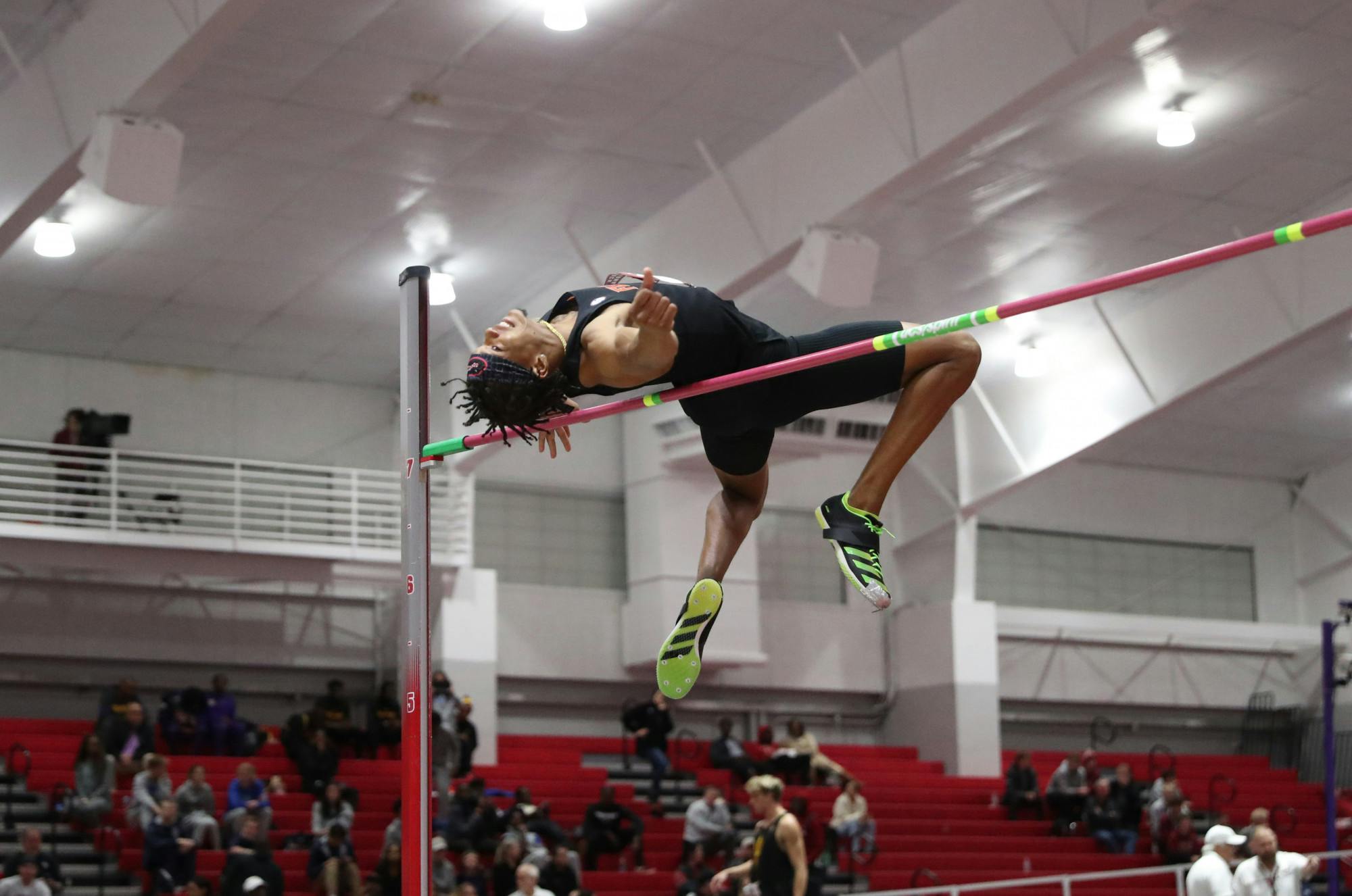 Redshirt senior Corvell Todd participates in the men's high jump during the Razorback Invitational Friday, Jan. 27, 2023 at Randal Tyson Track Center in Fayetteville, Arkansas / photo by Anna Carrington