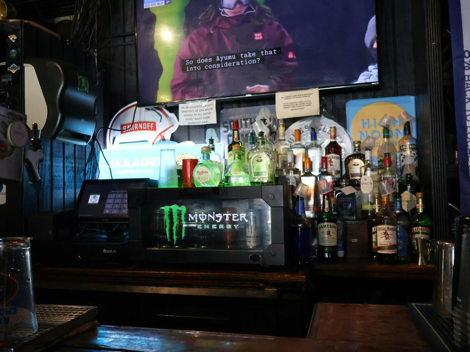 Behind the bar at Mom's OG, a dive bar in Gainesville, Fla., Monday, Jan. 12, 2026.