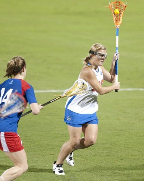 Florida attacker Caroline Cochran drives in an exhibition against England on Jan. 26. The Gators’ lone senior, Cochran suffered a torn ACL in the first game of the season.&nbsp;