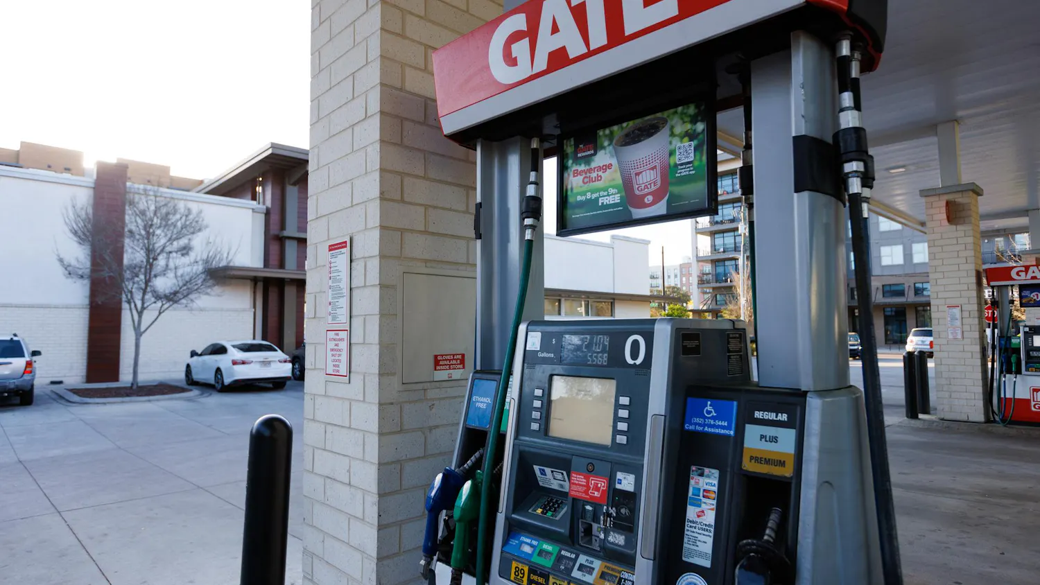 A gas pump displays current gas prices at a Gate gas station on Friday, March 13, 2026, in Gainesville, Fla.