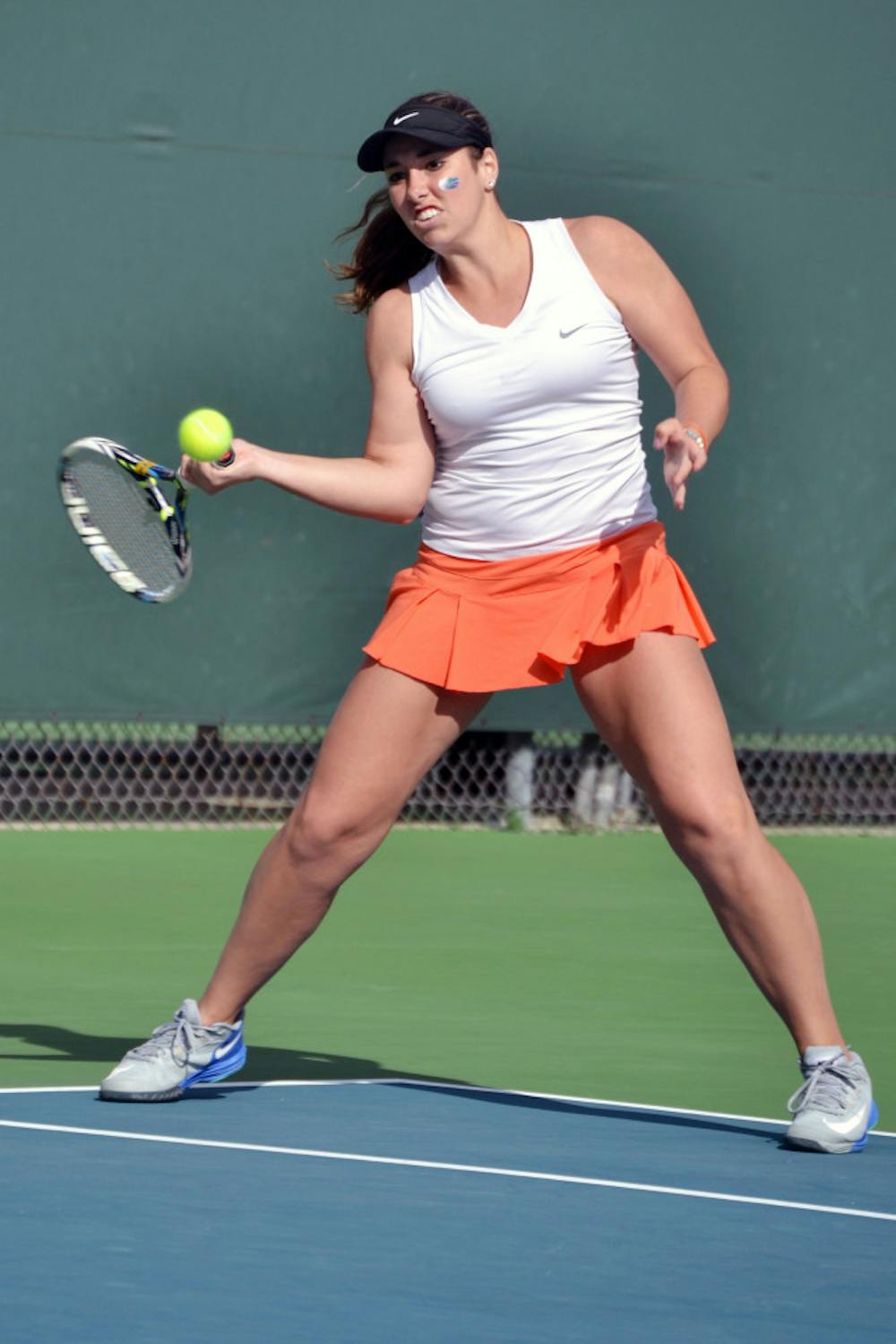 <p>Brooke Austin hits an open-stance backhand during Florida women's tennis' 4-0 win against Elon on Jan. 24, 2015, at the Ring Tennis Complex.</p>