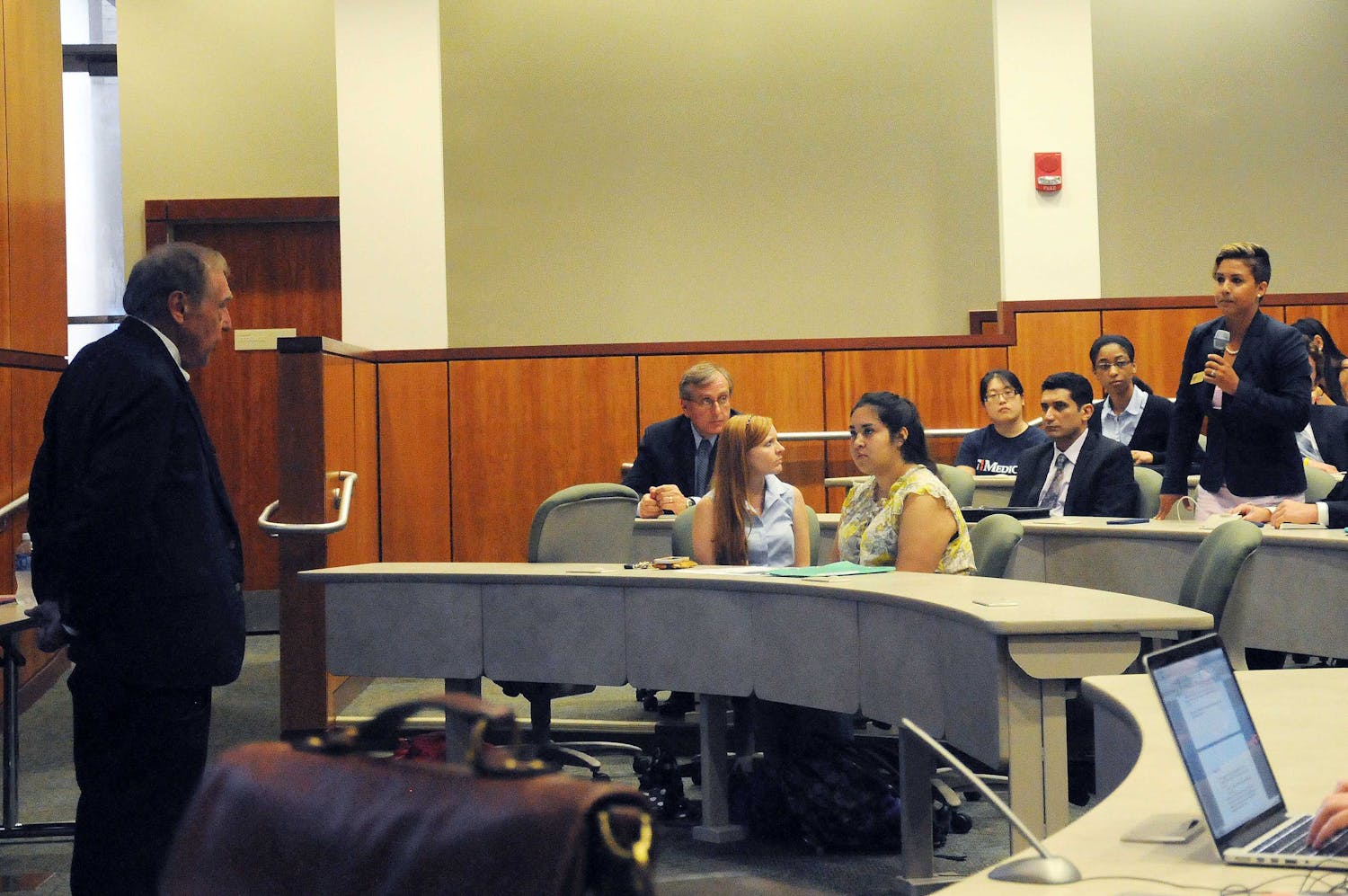 UF student Denae Campanale (right) addresses her concerns about diversity to Winfred Phillips, chairman of President Kent Fuchs' goal-setting task force, at the student town hall meeting on July 7, 2015, at the UF Levin College of Law.