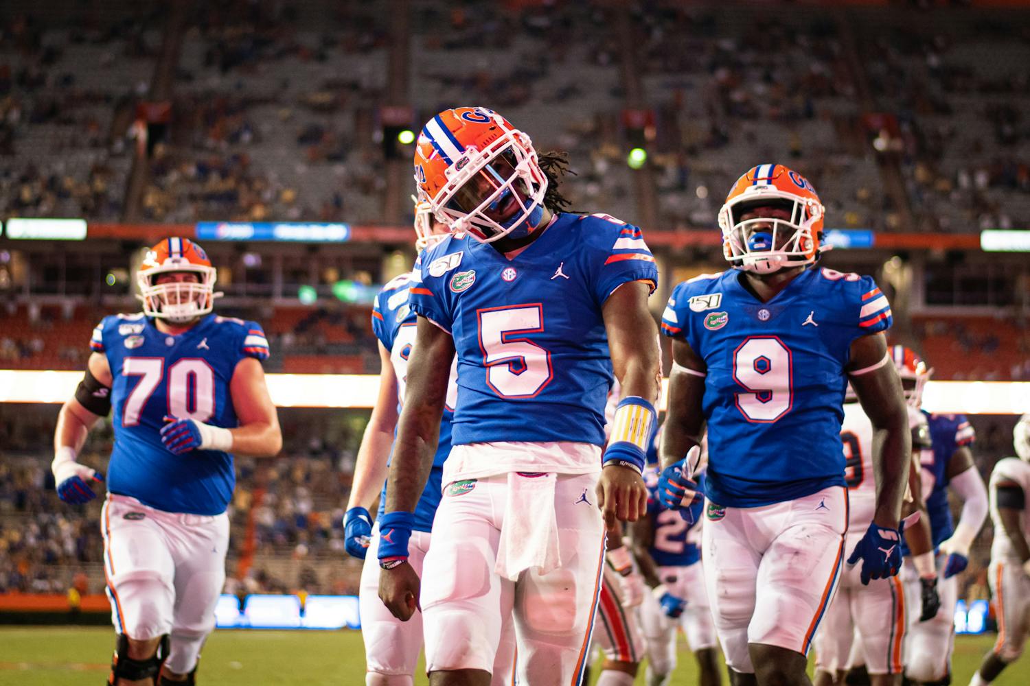 Florida quarterback Emory Jones (5, pictured) struts after scoring a touchdown. Jones finally gets the call to start the 2021 season after three years in backup duty.