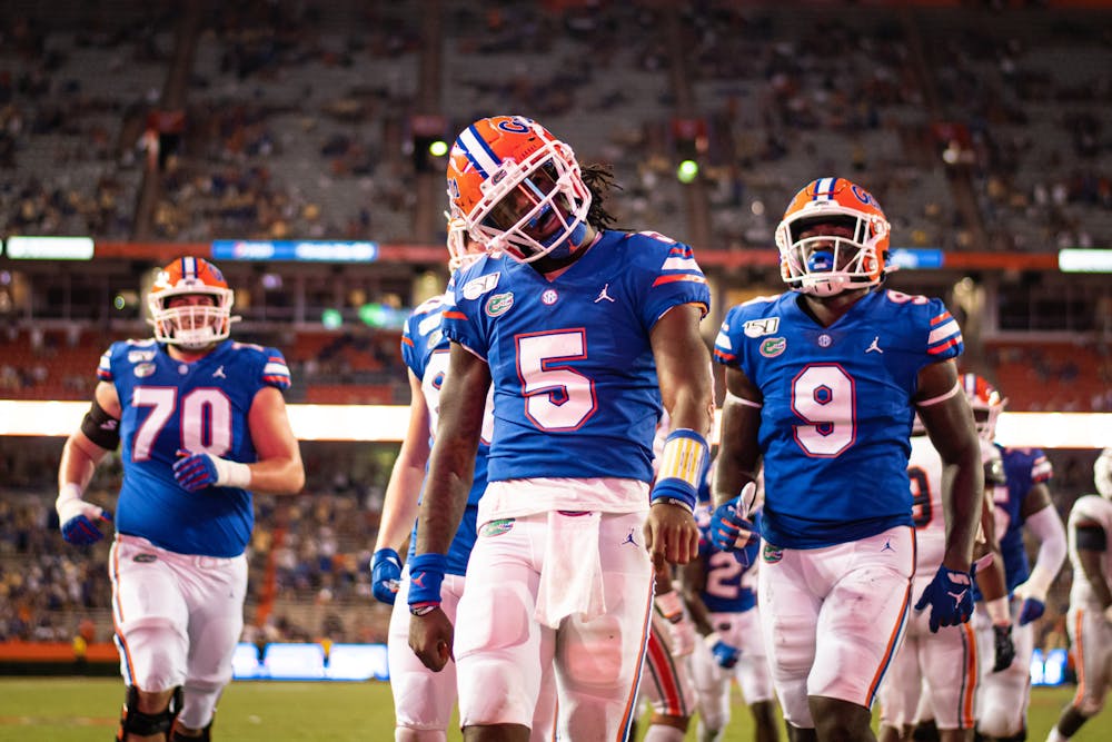Florida quarterback Emory Jones (5, pictured) struts after scoring a touchdown. Jones finally gets the call to start the 2021 season after three years in backup duty.