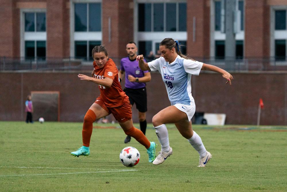 Florida's Kelsey Smith driving the ball past Texas defender and into the box during their matchup against the longhorns in Gainesville, Fla. Thursday, Sept. 24.