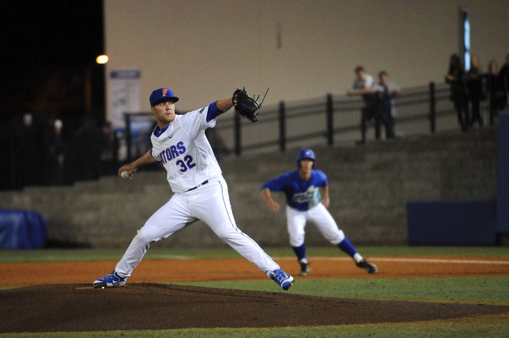 Logan Shore pitches during Florida's 4-2 win against Florida Gulf Coast on Feb. 19 at McKethan Stadium.