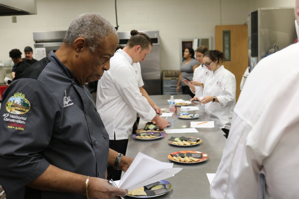 Judges test quesadillas made by Eastside High in the NASA Astronaut Culinary Challenge.