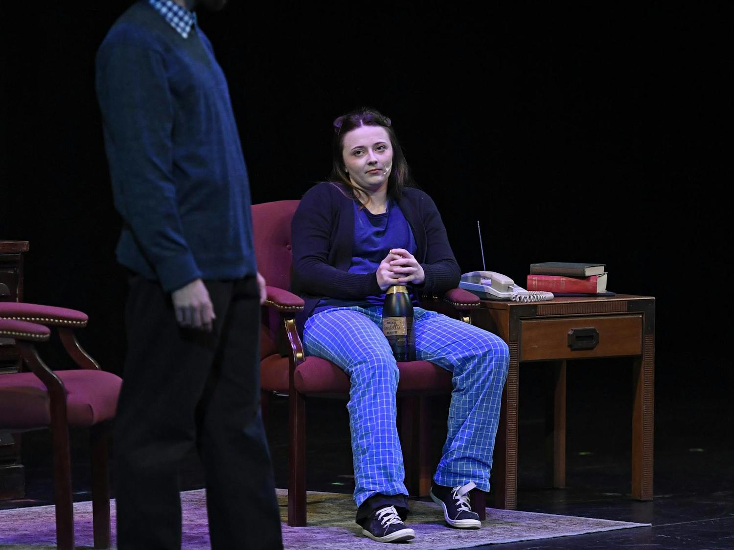 An actress watches an actor as a “ten-minute play” is performed on Friday, Jan. 30, 2026, at the Jackson N. Sasser Fine Arts Hall at Santa Fe College in Gainesville, FL. (Matthew Lewis)