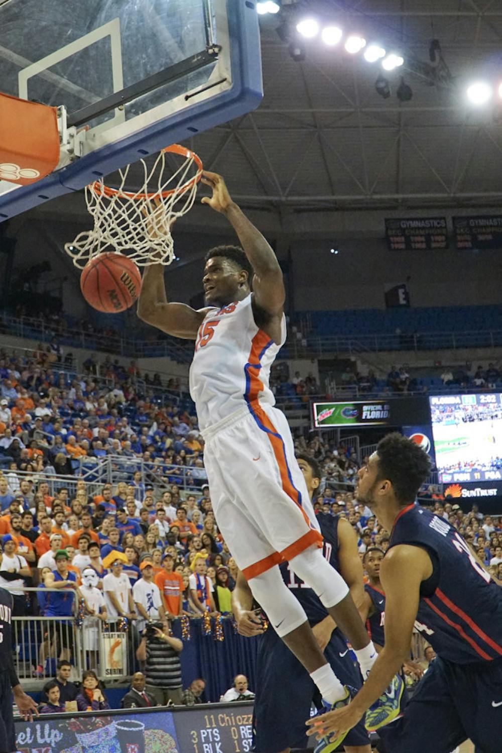 <p>UF's John Egbunu dunks during Florida's 76-56 win against Richmond on Dec. 1, 2015, in the O'Connell Center.</p>