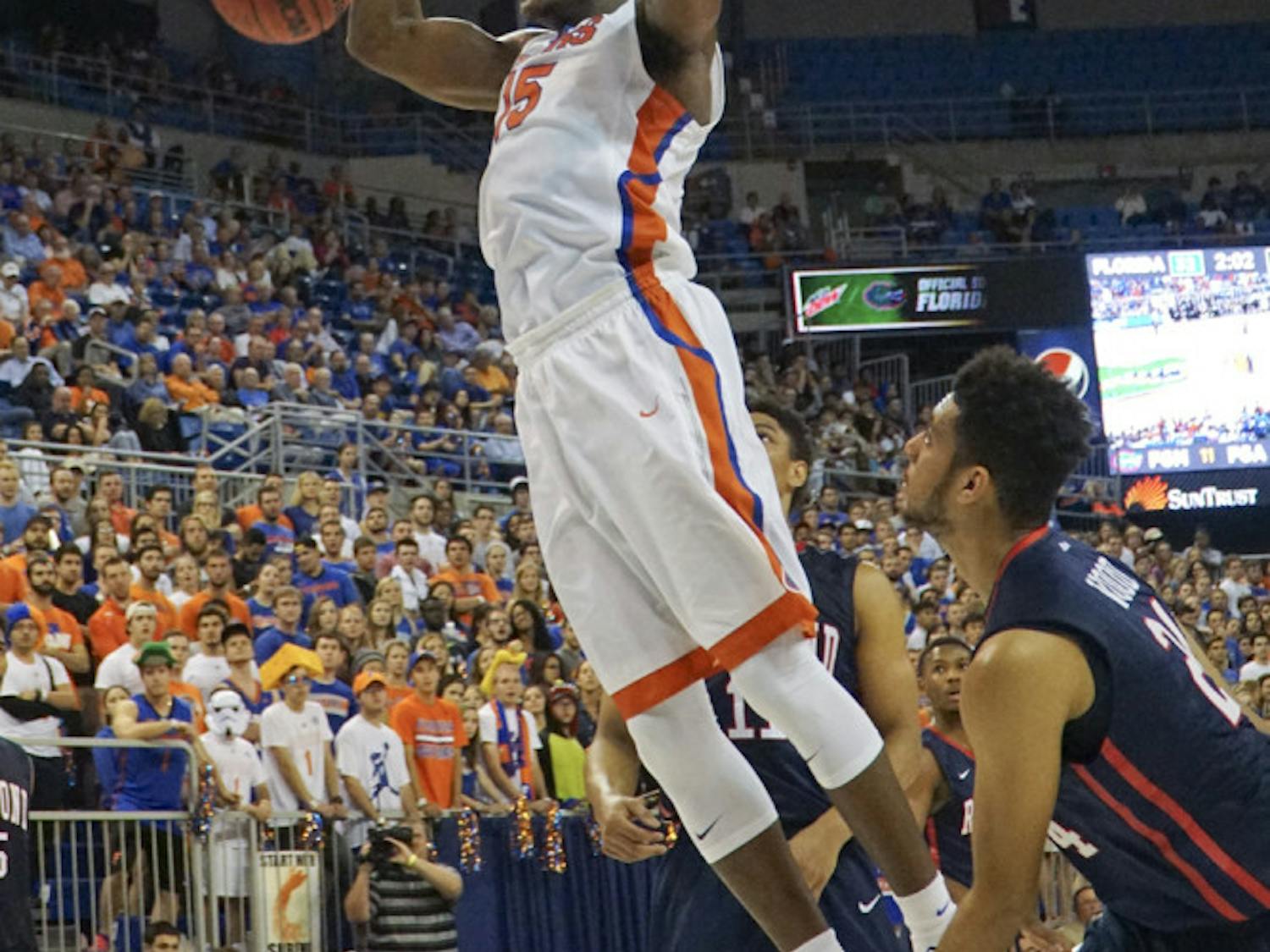 UF's John Egbunu dunks during Florida's 76-56 win against Richmond on Dec. 1, 2015, in the O'Connell Center.