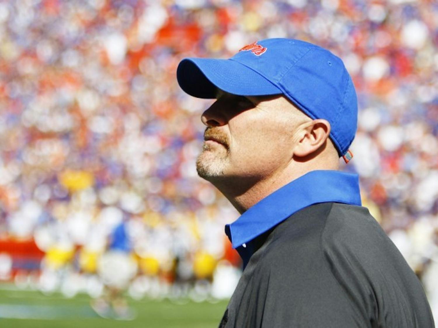 Defensive coordinator Dan Quinn looks on during Florida’s 14-6 win against LSU on Oct. 6 at Ben Hill Griffin Stadium. Quinn and coach Will Muschamp have put an emphasis on forcing turnovers.&nbsp;