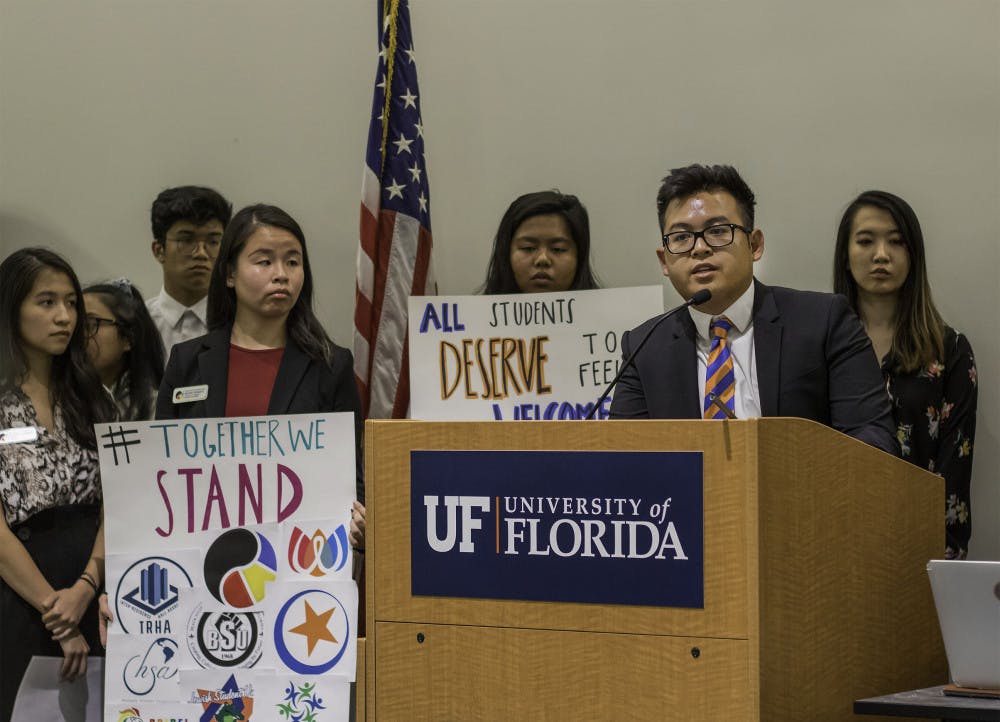 Kevin Nguyen, president of the Vietnamese Student Organization, speaks during the public comment part of the UF Student Government Senate meeting on Aug. 6. Nguyen began by stating things SG members all have in common. He said that they were all Gators, all served in the Senate and all could make a difference. “We all have the potential to do something great,” Nguyen said.