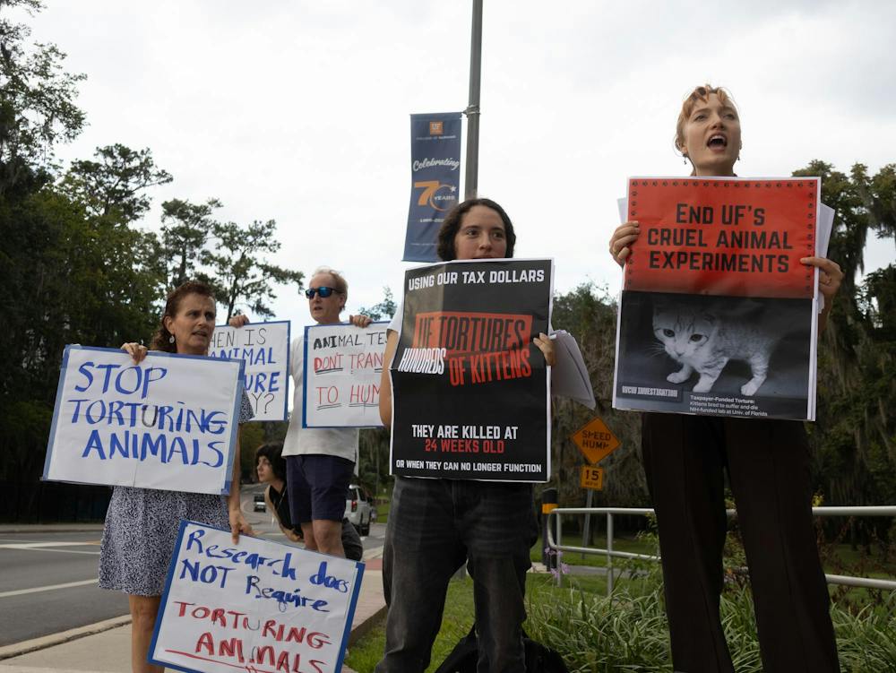 Cheyenne Lukaner leads chant in front of UF’s Communicore Building to protest animal experimentation in UF labs Friday, Oct. 16, 2026 in Gainesville, Fla.