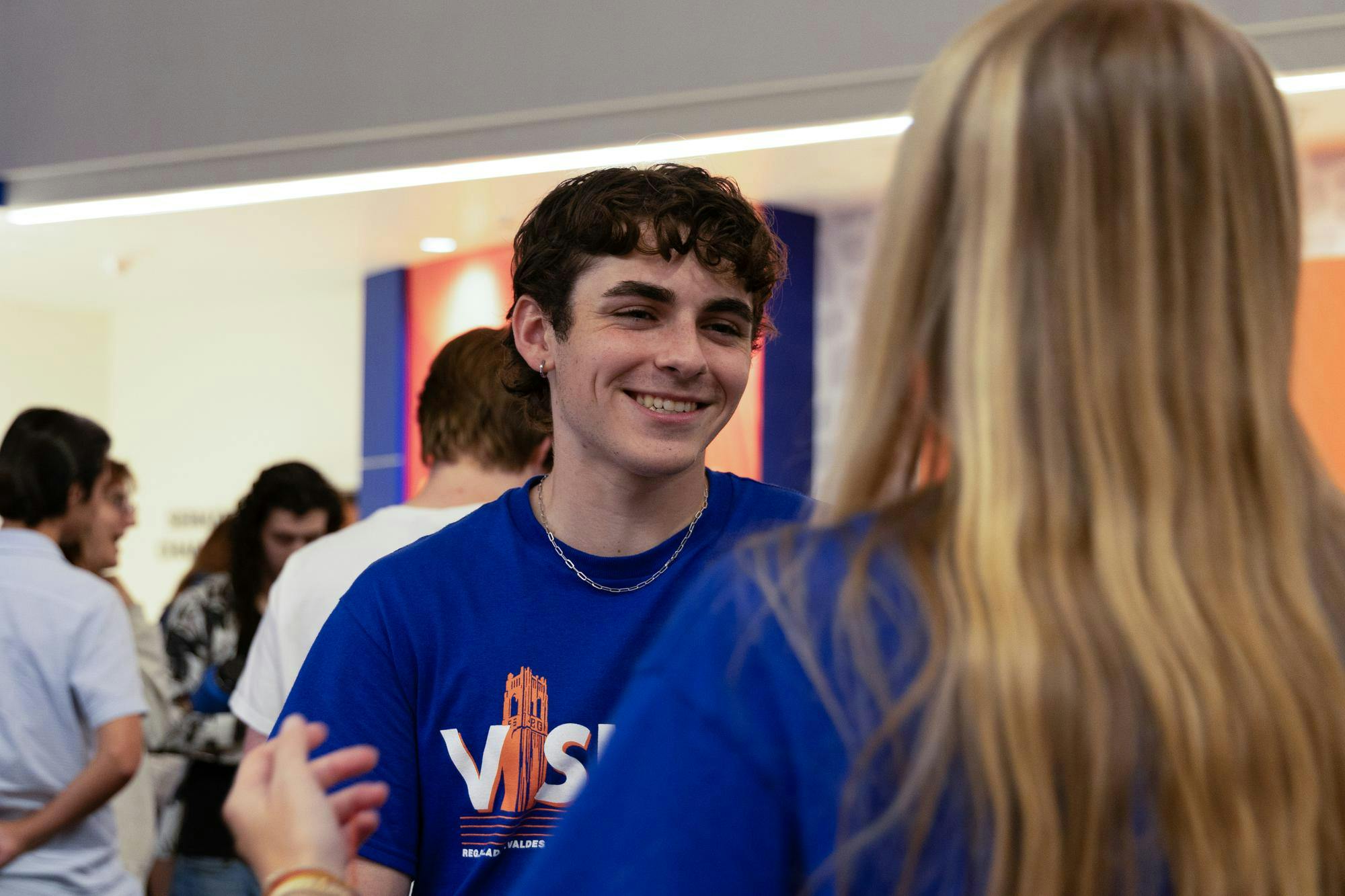 Two members of Vision Party talk while awaiting the results of the Fall 2026 student government elections in the Reitz Union on UF's campus, Wednesday, Sept. 30, 2026.