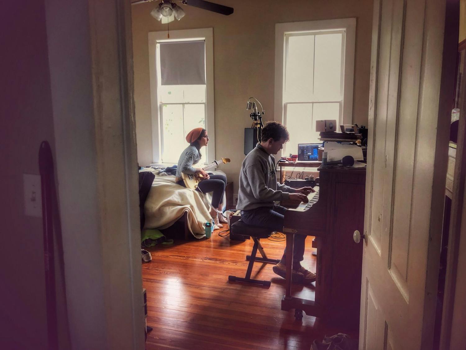Deitz (left) and her partner during the recording process of "Temporary Clouds".