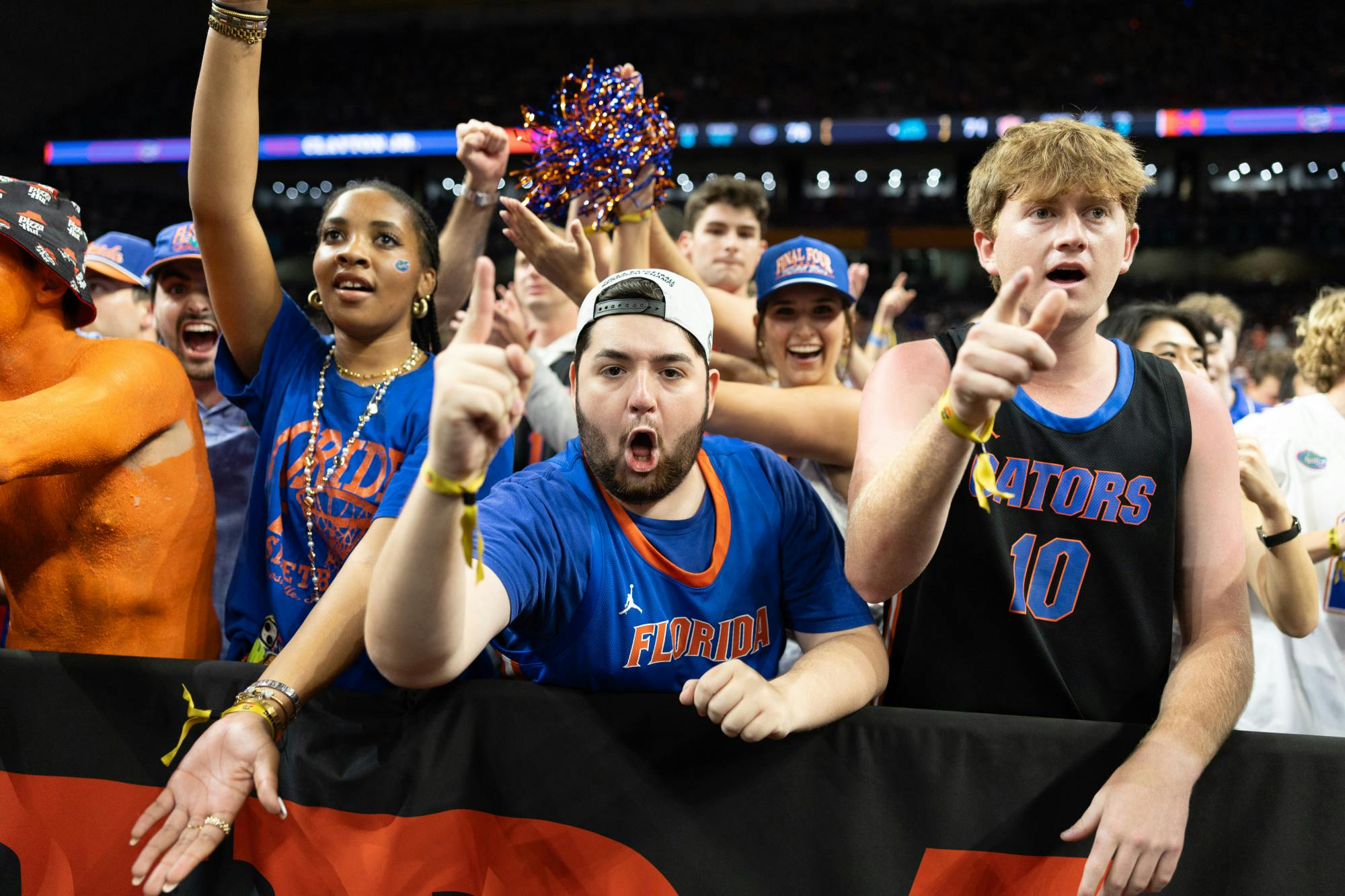 The Florida Gators student section celebrates during a basketball game against the Auburn Tigers in the Final Four round of the NCAA Tournament on Saturday, April 5, 2025, in San Antonio, Texas.