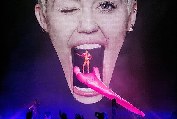 Miley Cyrus performs on her "Bangerz Tour" in 2014.