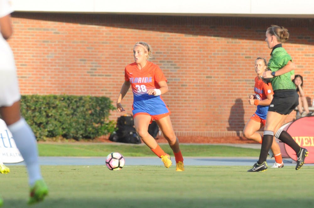 <p>UF midfielder Gabby Seiler dribbles down the field during Florida's 5-2 win against Iowa State on Aug. 19, 2016, at James G. Pressly Stadium.</p>