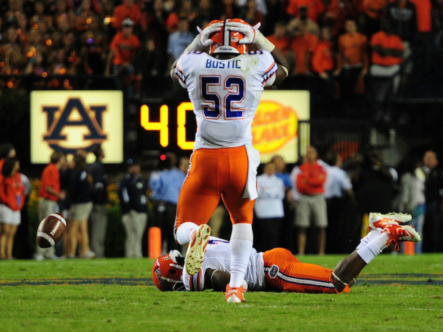 Linebacker Jelani Jenkins (bottom) dropped an interception in the fourth quarter of Saturday’s 17-6 loss at Auburn. Florida hasn’t forced a turnover since the second half against Kentucky on Sept. 24.
