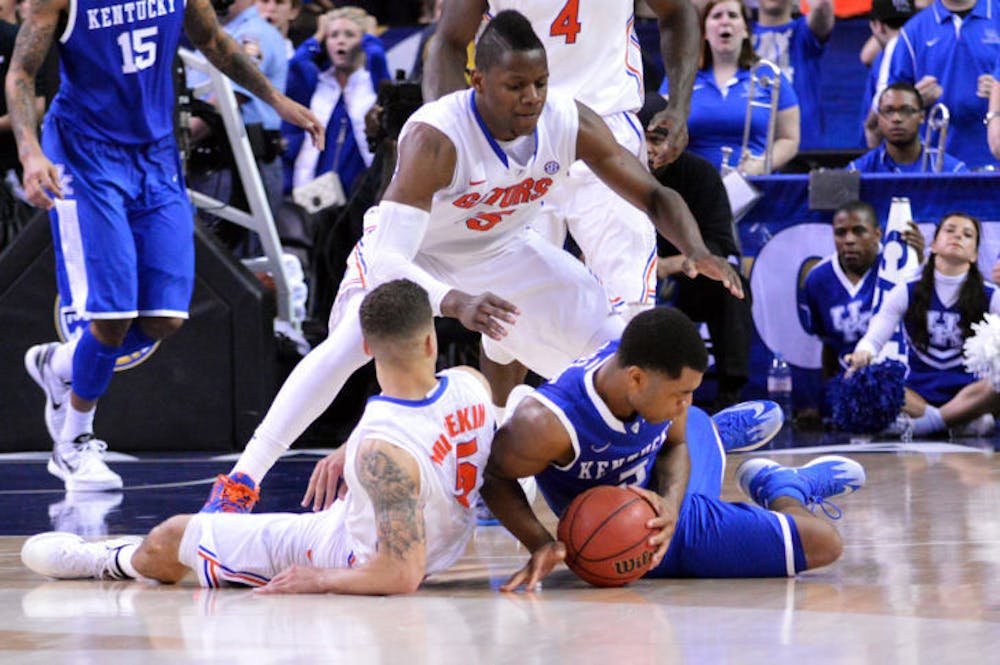 <p>The Southeastern Conference Tournament final pitted the Gators and Wildcats against one another for the third time in the 2013-2014 season.</p>
<p>With just more than 11 minutes on the clock and down by 15, the Wildcats proceeded to go on a 21-7 run to cut the Gators’ lead to 61-60 with 1:31 left in the game.</p>
<p>After Scottie Wilbekin and Dorian Finney-Smith each missed free throws with fewer than 30 seconds to go, UK had a chance to jump ahead and capture the SEC Tournament on the final possession.</p>
<p>However, when James Young had an open lane, he slipped and lost possession of the ball to secure Florida’s first SEC Tournament championship since 2007.</p>