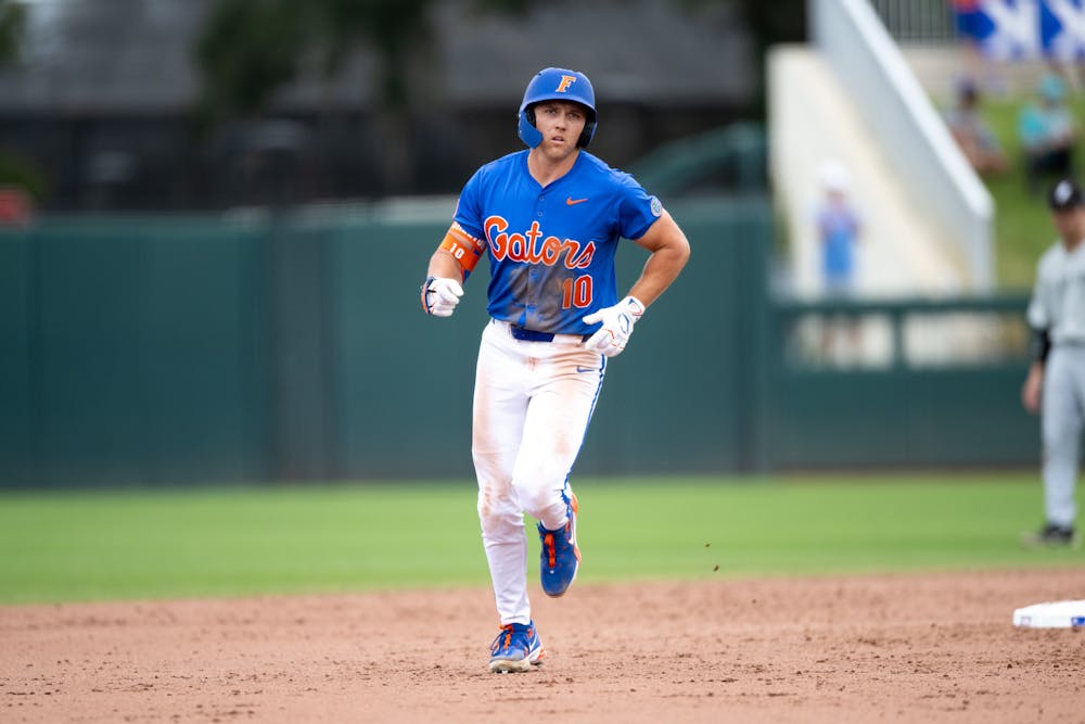 Florida Gators infielder Colby Shelton (10) jogs around the bases after hitting a home run in a baseball game against the Air Force Academy in Gainesville, Fla., on Friday, Feb. 15, 2025.