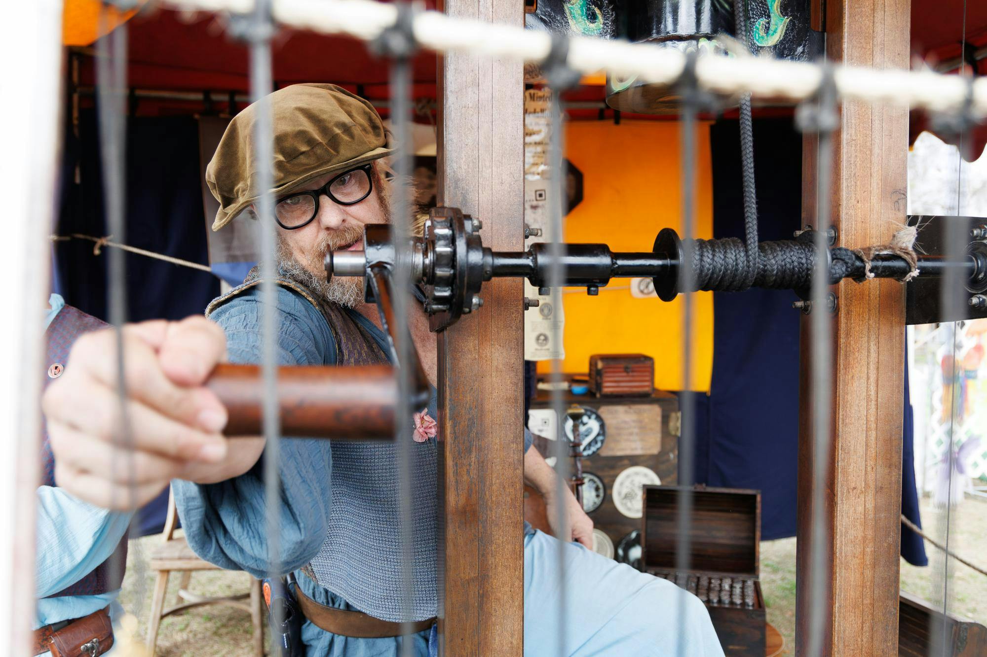 Hans Heinen welds a coin at the Hoggetown Medieval Faire at Depot Park, Sunday, Jan. 25, 2026.