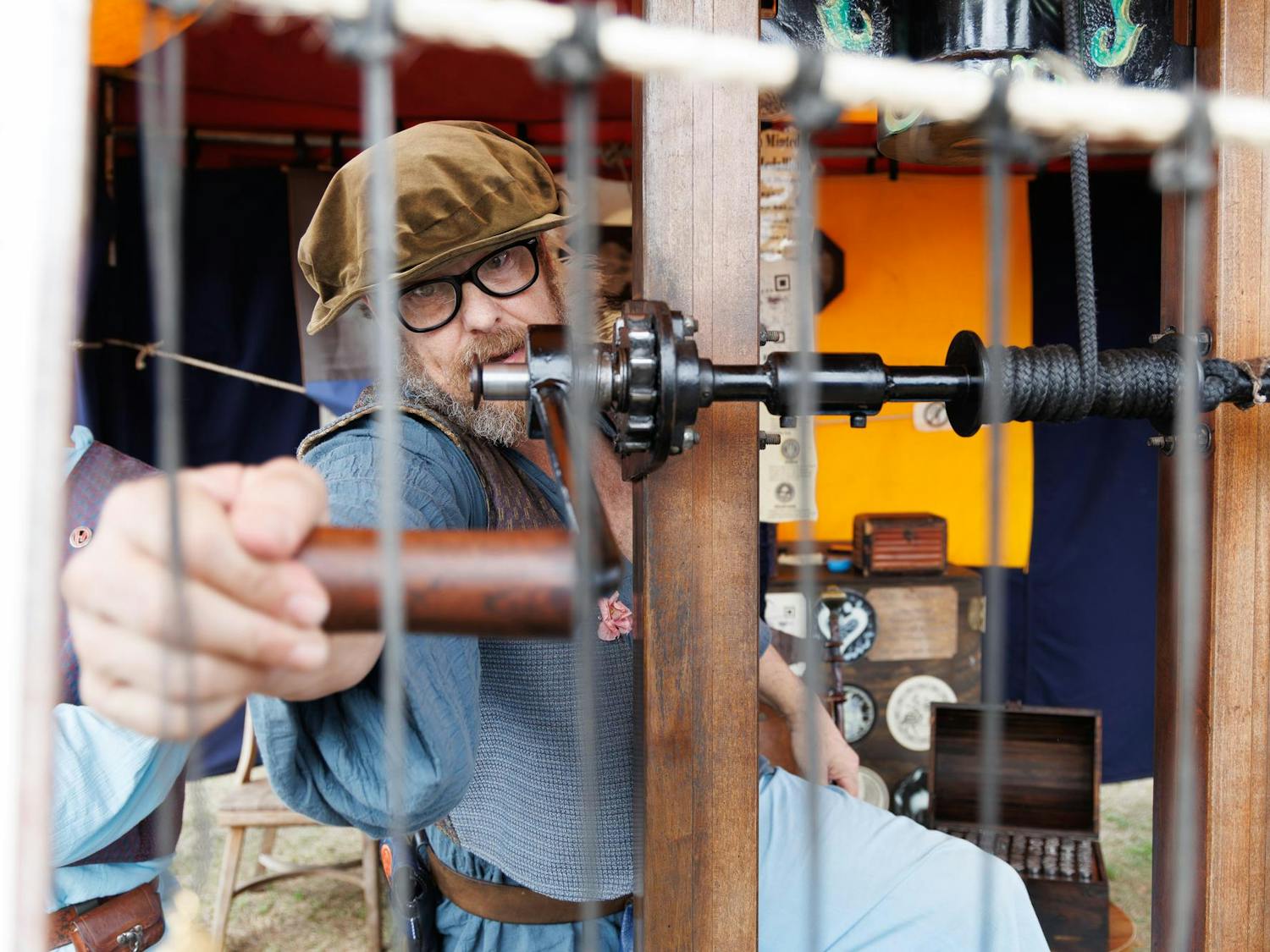 Hans Heinen welds a coin at the Hoggetown Medieval Faire at Depot Park, Sunday, Jan. 25, 2026.