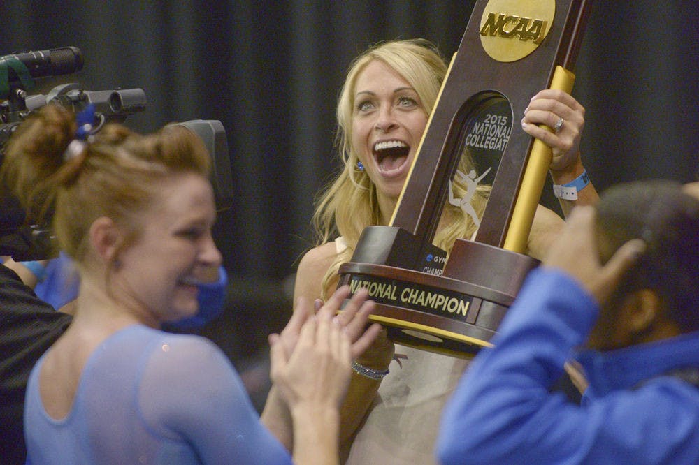 Florida gymnastics head coach Rhonda Faehn celebrates winning the NCAA national championship during the 2015 NCAA gymnastics championships on Saturday in Fort Worth, Texas.