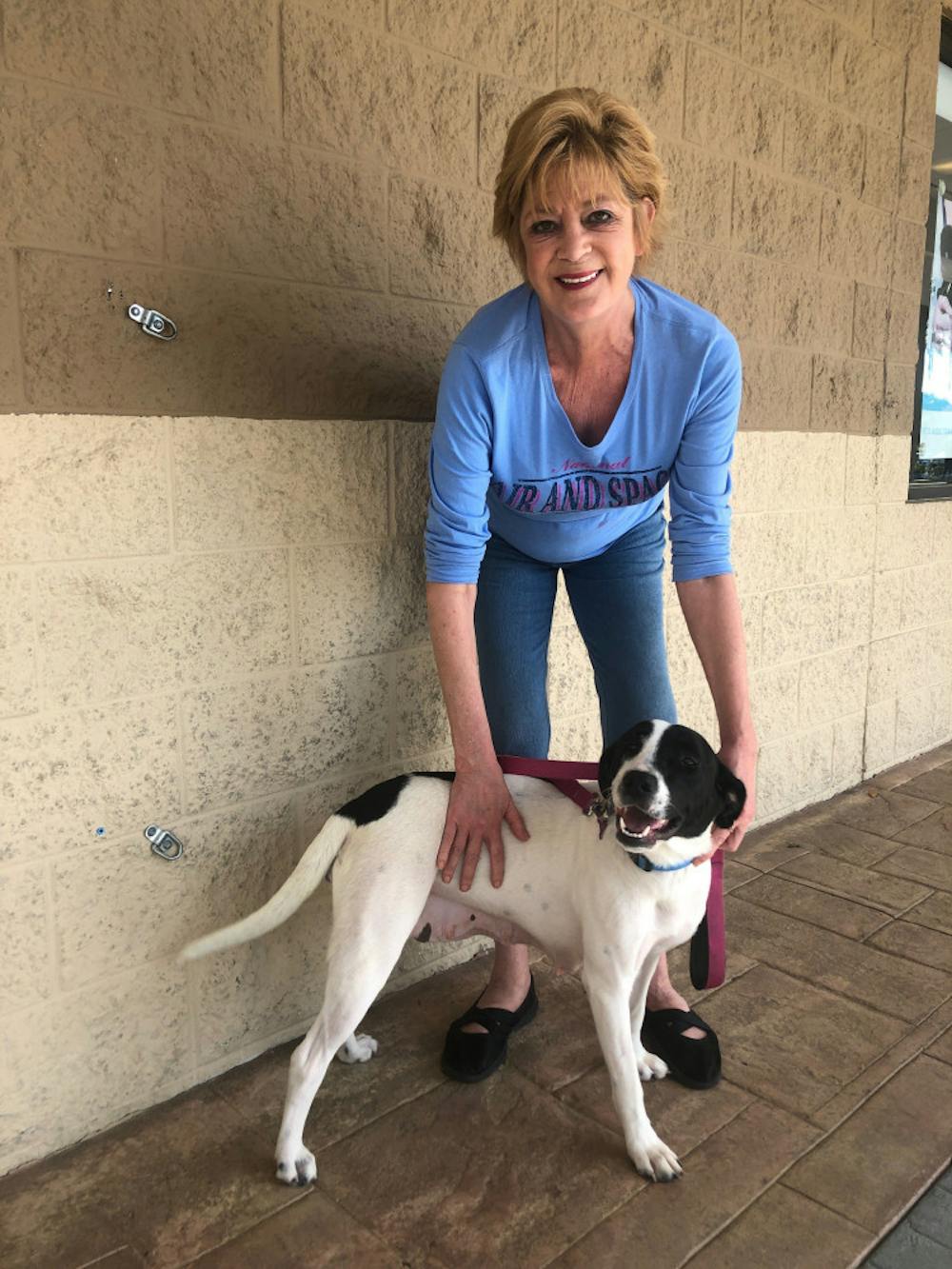 <p>Kathryn Davis and Abbey pose for a picture after being united by Faithful Friends Pet Rescue and Rehoming. Many Gainesville animal shelters have seen an increase in adoptions amid the COVID-19 crisis.</p>