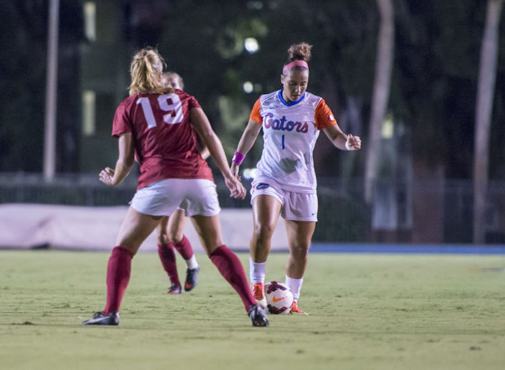 <p>Lauren Silver dribbles the ball during Florida’s 3-0 victory against Alabama on Friday at James G. Pressly Stadium. The junior defender recorded four assists during the Gators’ first seven games this season.</p>