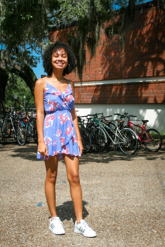 Keala Moncur, 17, donning a bright floral dress and chunky sneakers as she begins her first semester.