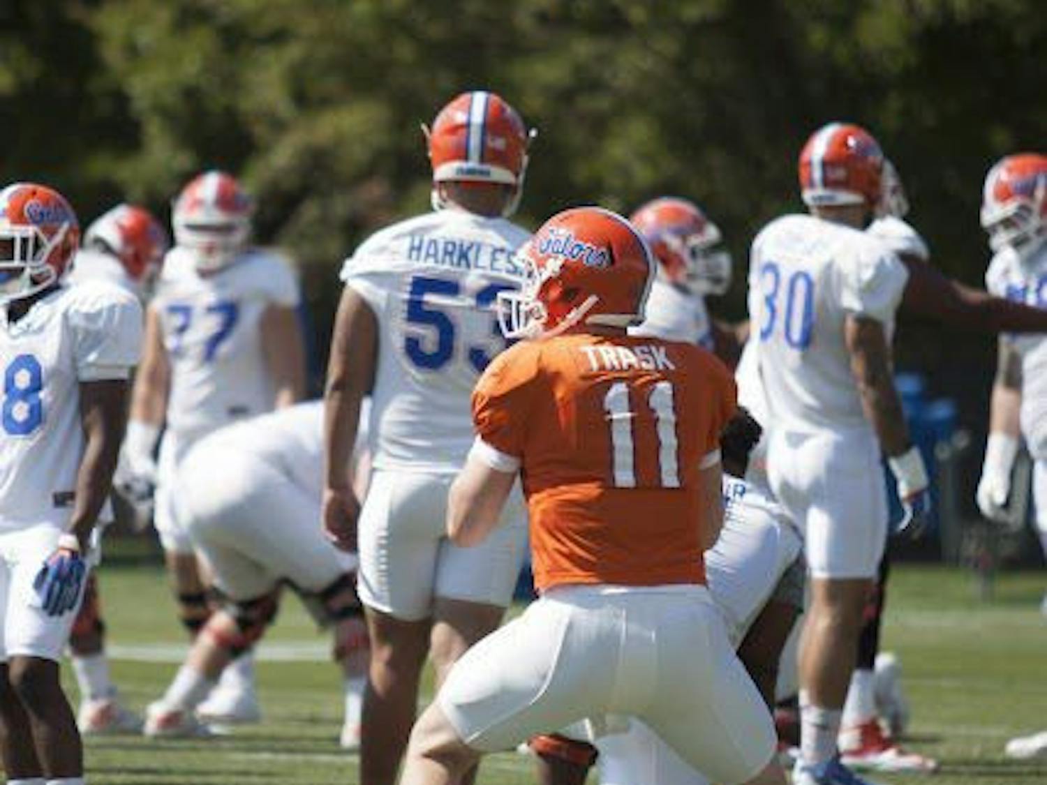 UF quarterback Kyle Trask drops back to pass during a spring practice at the Sanders Practice Field on March 22, 2017.