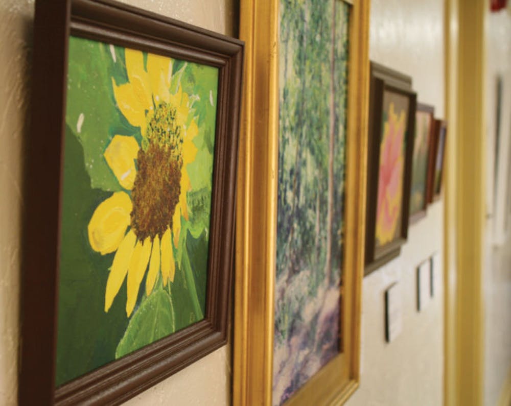 <p>The Thomas Center Mezzanine Gallery displays work created by Alachua County Public Schools staff for the exhibition “The Artist in All of Us.” The show is scheduled to run until Nov. 16.</p>