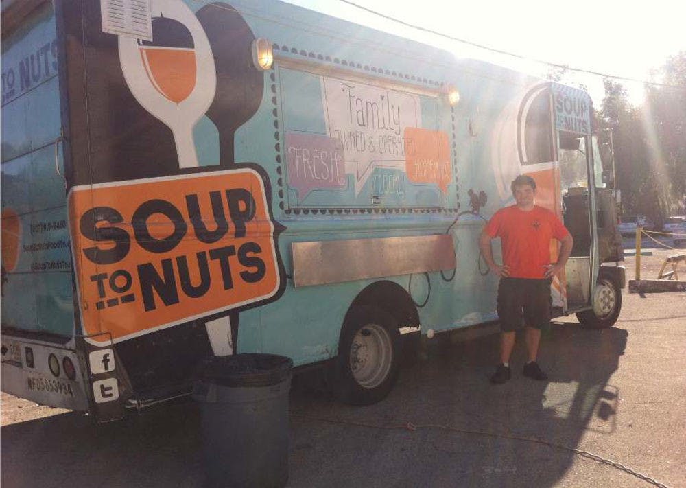 <p class="p1">Peter Sturgeon, 26, stands outside his food truck, Soup to Nuts, as he prepares for an event at First Magnitude Brewery.&nbsp;</p>