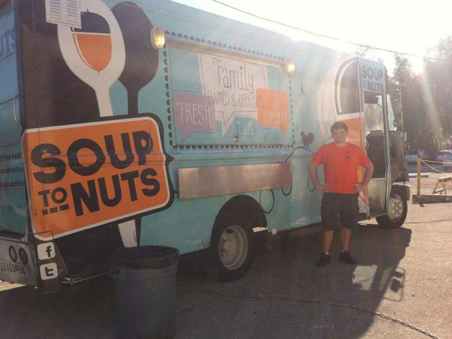 Peter Sturgeon, 26, stands outside his food truck, Soup to Nuts, as he prepares for an event at First Magnitude Brewery. 