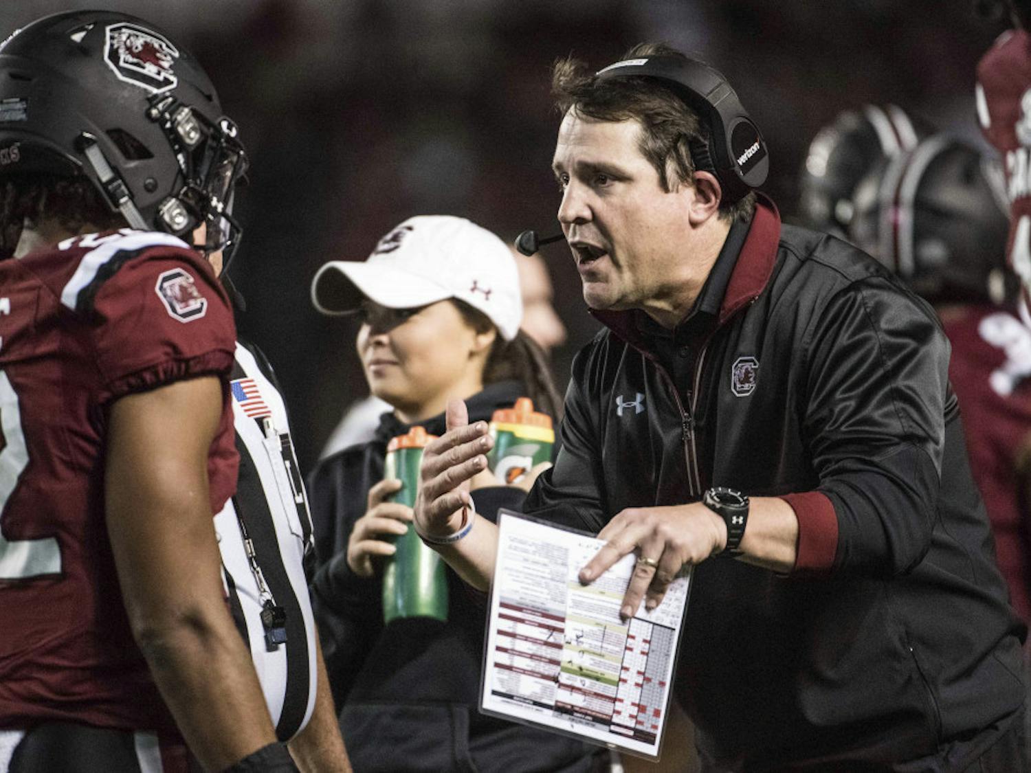 South Carolina head coach Will Muschamp, right, communicates with defensive back Steven Montac (22) during the second half of an NCAA college football game Saturday, Nov. 5, 2016, in Columbia, S.C. South Carolina defeated Missouri 31-21. (AP Photo/Sean Rayford)
