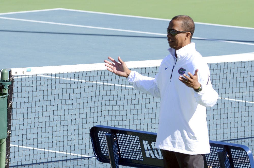 UF men's tennis coach Bryan Shelton reacts during Florida's 9-3 win against William &amp; Mary on Jan. 10, 2015 at the Ring Tennis Complex.