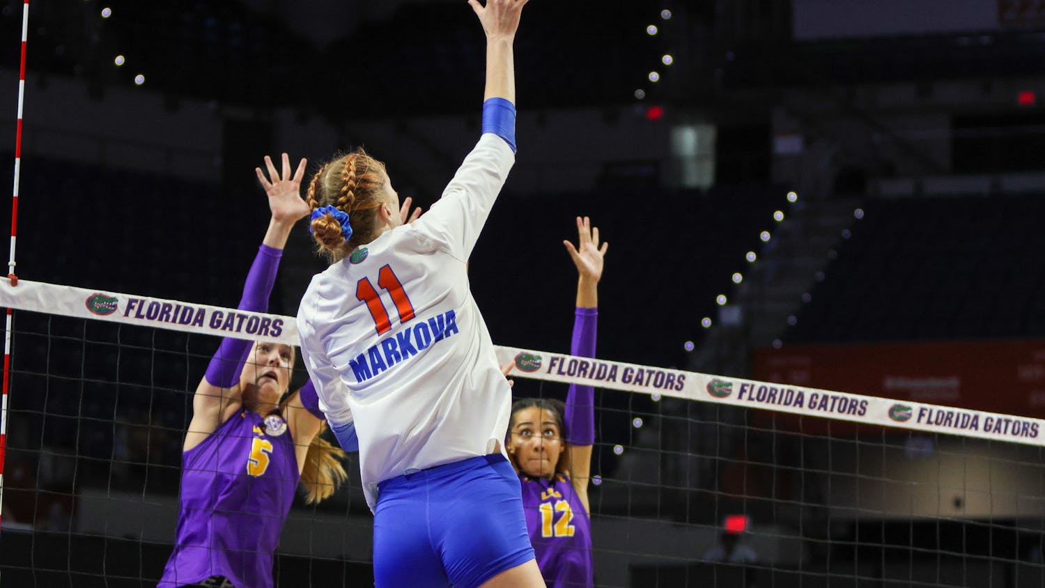UF senior outside hitter Marina Markova rises above the net for a spike against the LSU Tigers Sunday, Oct. 9, 2022. 