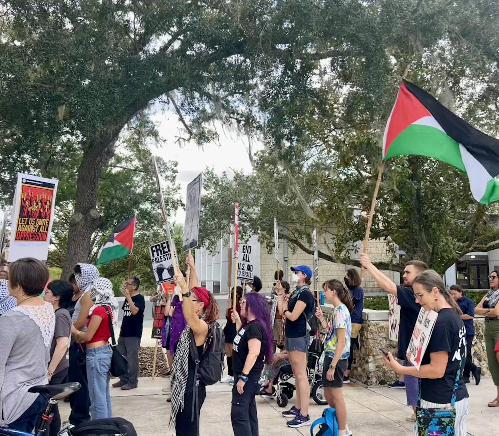 Protesters gather outside of Gainesville City Hall on Thursday, Sept. 5, 2024. 