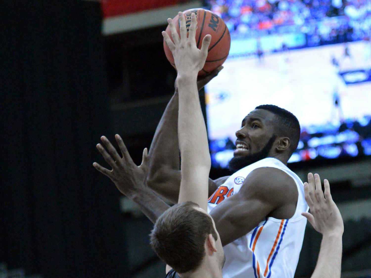 Patric Young attempts a shot during Florida’s 72-49 win against Missouri on March 14 in the Georgia Dome in Atlanta during the Southeastern Conference Tournament. Young was the 2014 SEC Defensive Player of the Year and averaged 6.4 rebounds per game on the season.